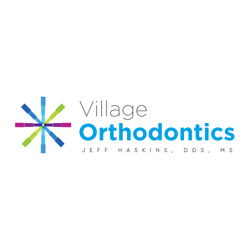 Village Orthodontics logo